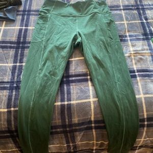 Green Victoria Secret athletic leggings. Size large with side pockets